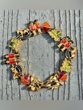 Avon Gold-Tone Vintage Holiday Charm Bracelet - Red, Green, Orange, Purple, Blue